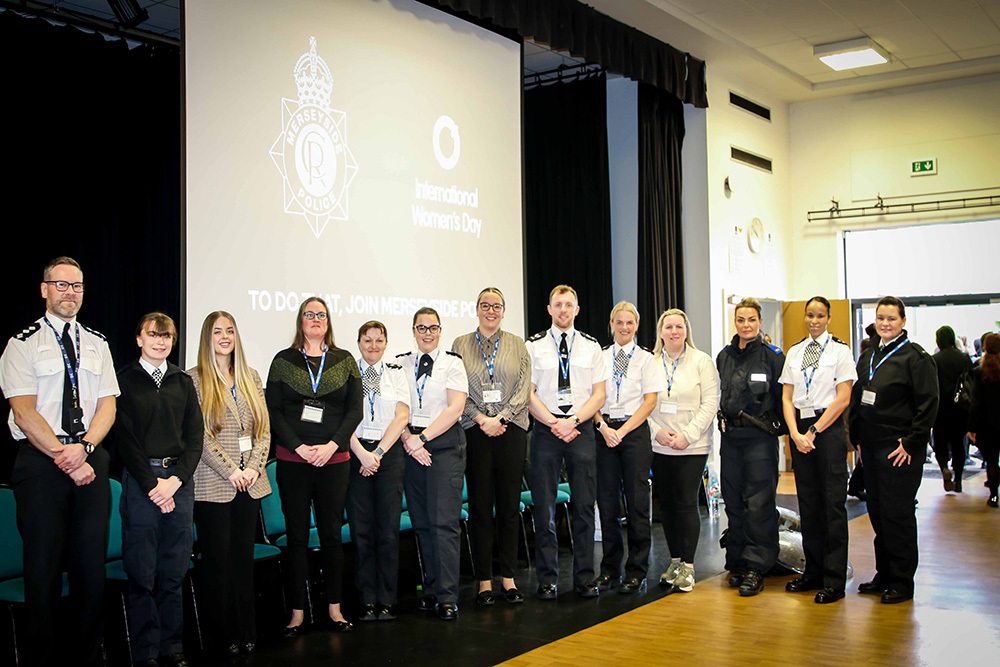 Image of police officers and staff