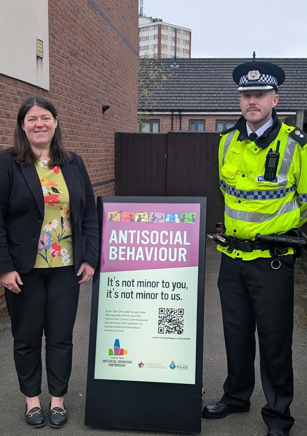 Chief Superintendent Karl Baldwin standing with Police and Crime Commissioner Emily Spurrell